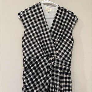 Deletta (Anthropologie) women’s‎ size Small black/white peplum top
